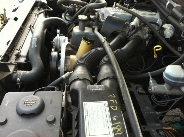 1989 Silver Ford F-150 Standard Cab Pickup