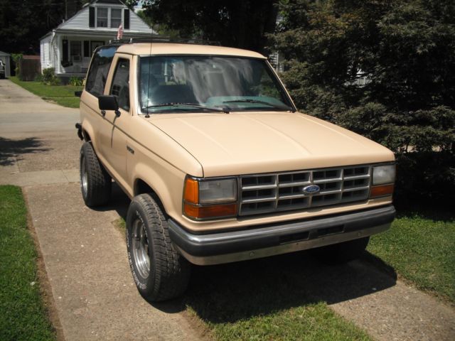 1989 Tan Ford Bronco II SUV