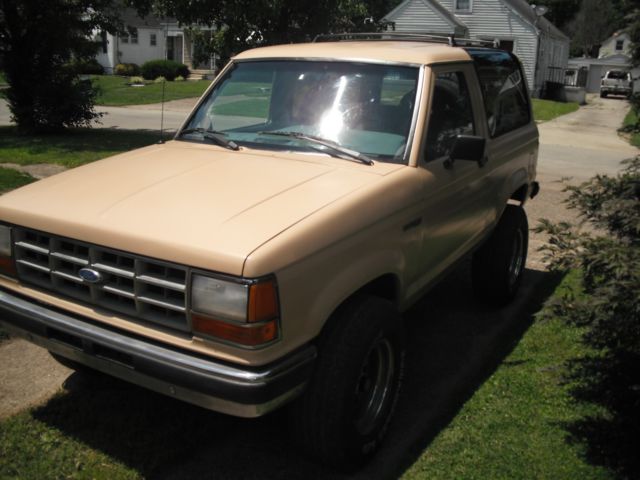 1989 Tan Ford Bronco II SUV