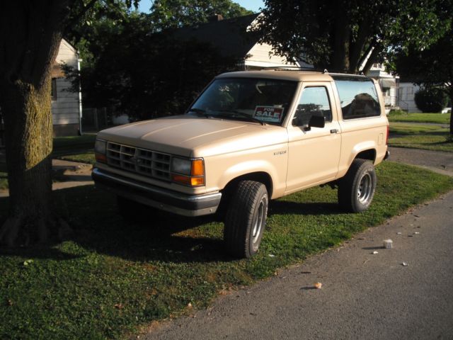 1989 Tan Ford Bronco II SUV