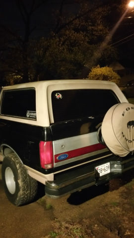 19890000 black Ford Bronco SUV