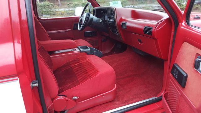 1989 red and white two tone Ford Bronco II SUV