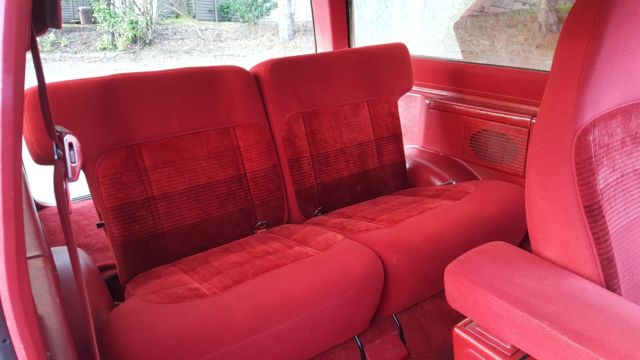 1989 red and white two tone Ford Bronco II SUV