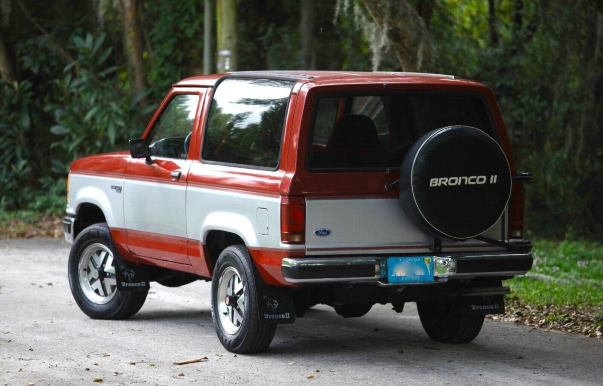 1989 red and Silver Ford Bronco II SUV