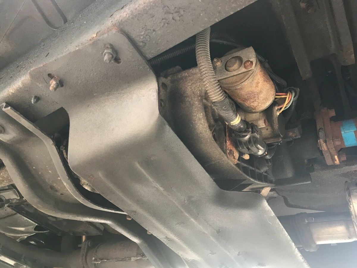 1989 red and Silver Ford Bronco II SUV