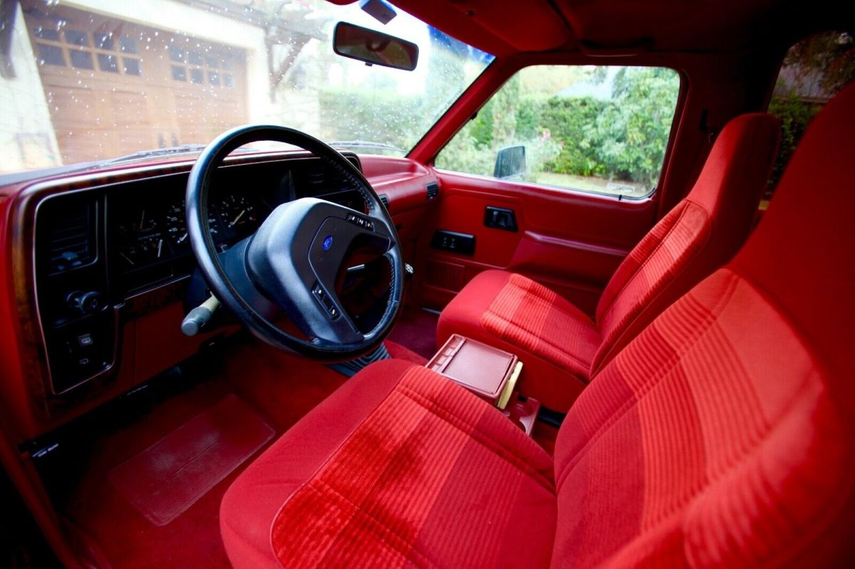 1989 red and Silver Ford Bronco II SUV
