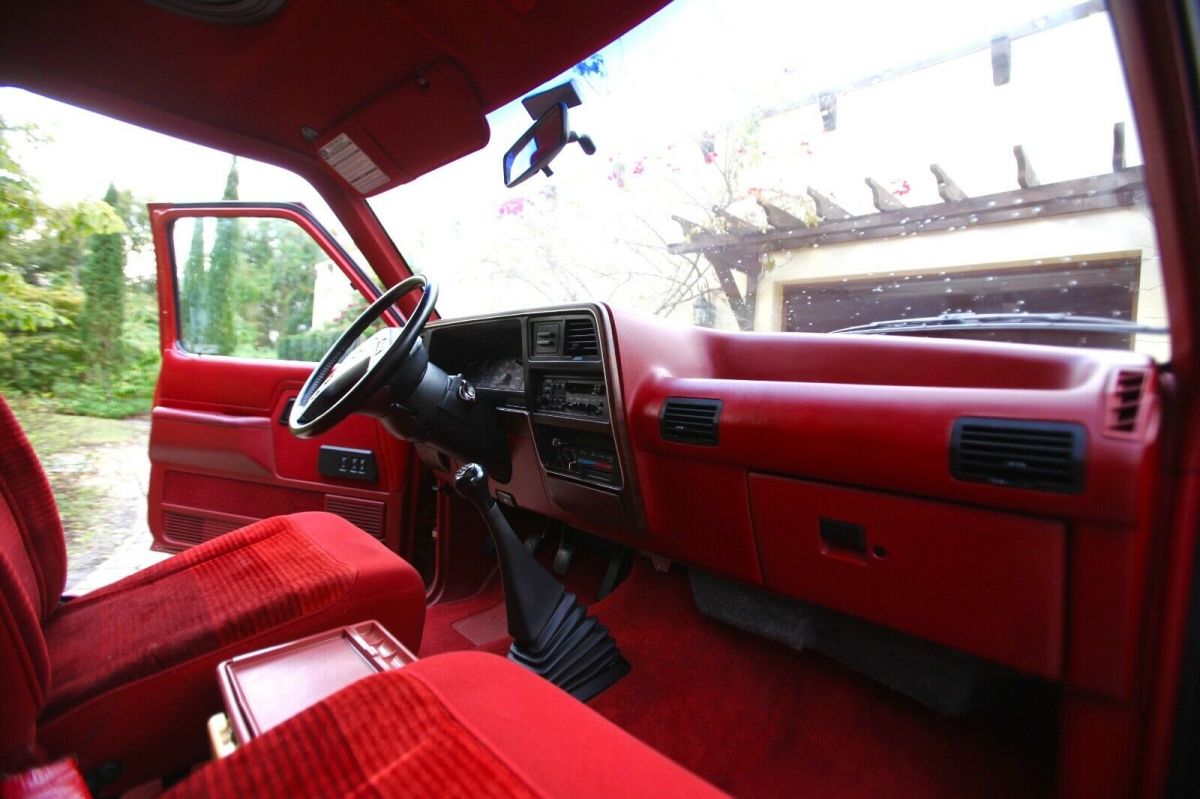 1989 red and Silver Ford Bronco II SUV