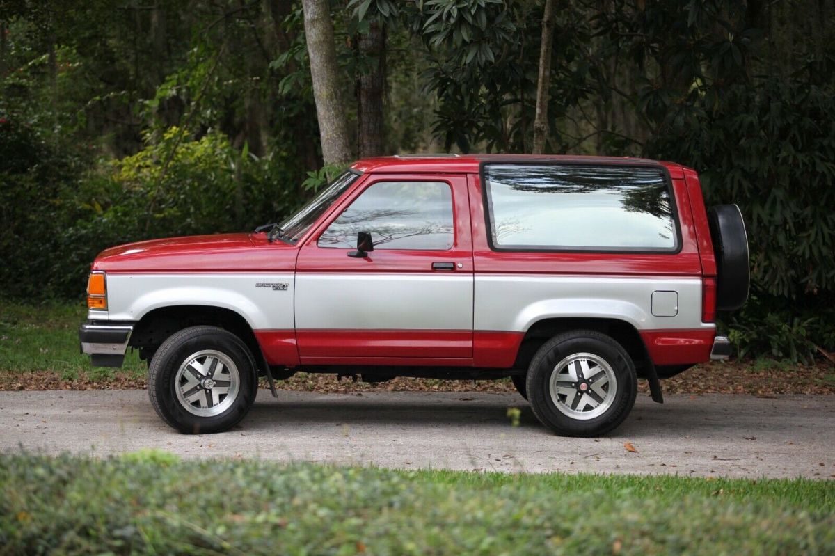 1989 red and Silver Ford Bronco II SUV