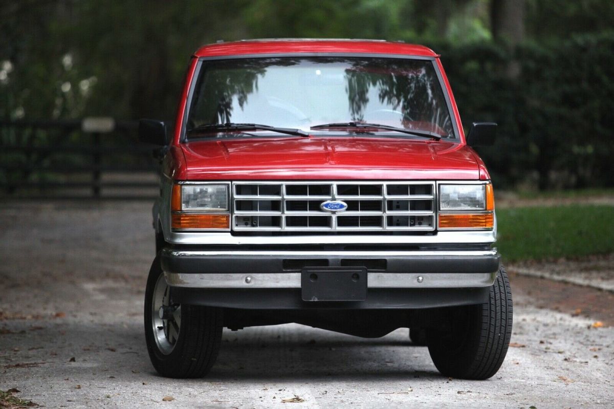 1989 red and Silver Ford Bronco II SUV