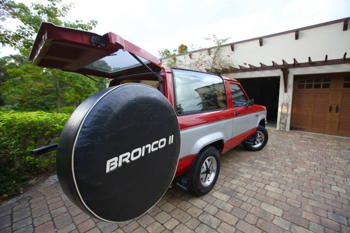 1989 red and Silver Ford Bronco II SUV