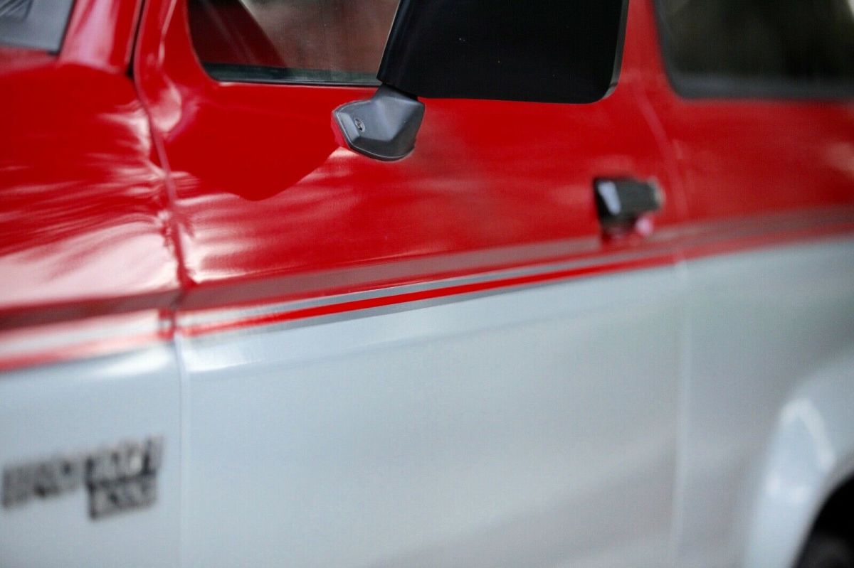 1989 red and Silver Ford Bronco II SUV