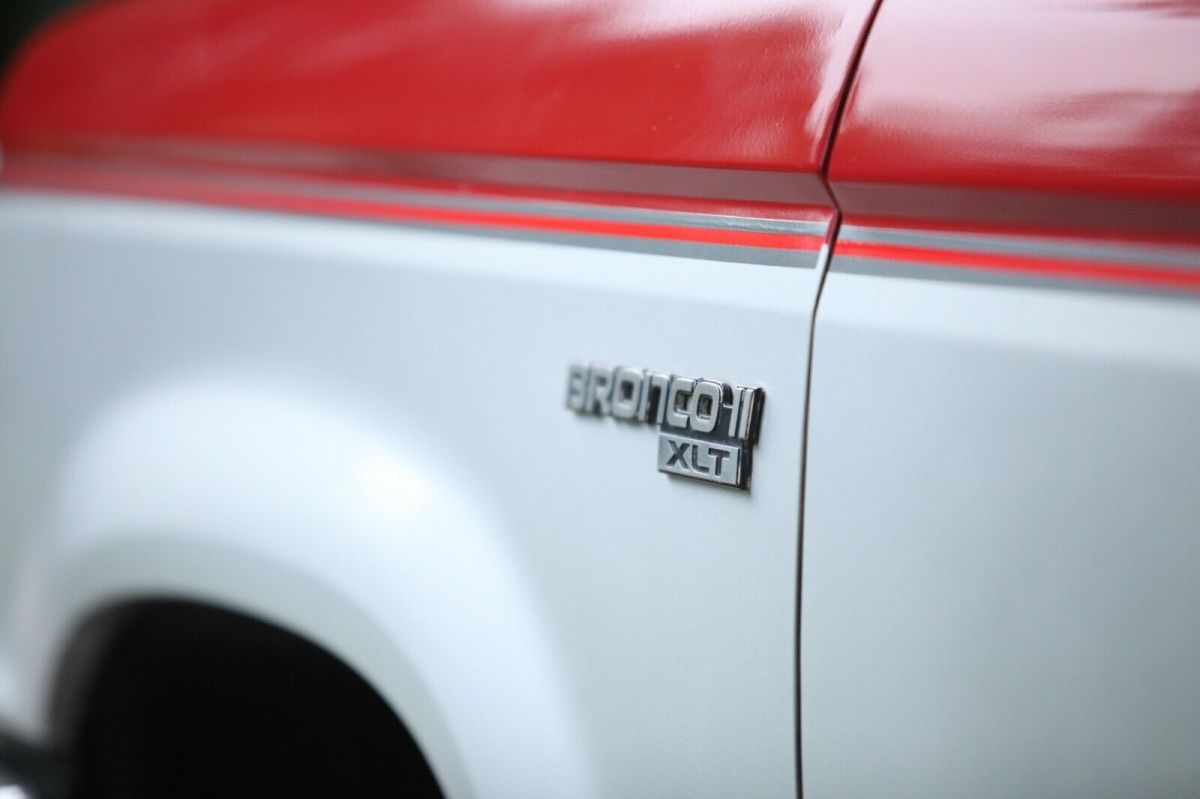 1989 red and Silver Ford Bronco II SUV