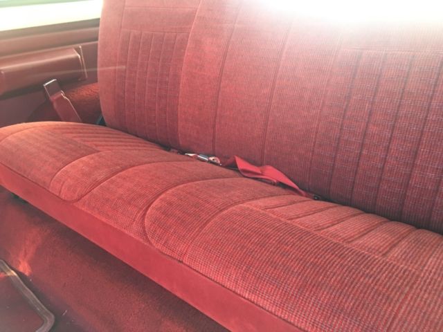 1989 Red and White Ford Bronco SUV