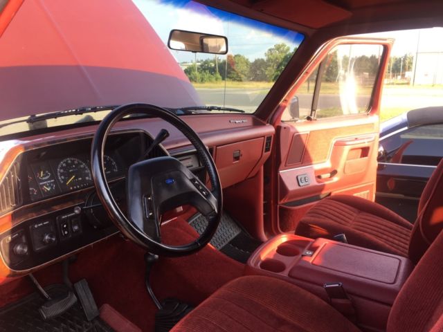 1989 Red and White Ford Bronco SUV
