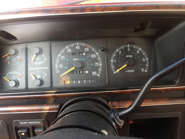 1989 Red and White Ford Bronco SUV