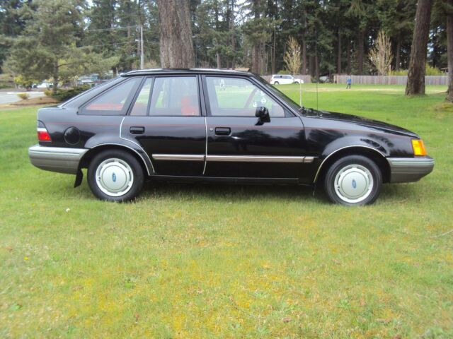 1989 Black Ford Escort Sedan