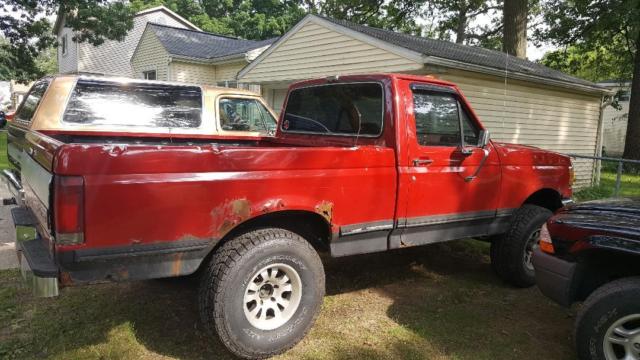 1989 Red Ford F-150 Standard Cab Pickup
