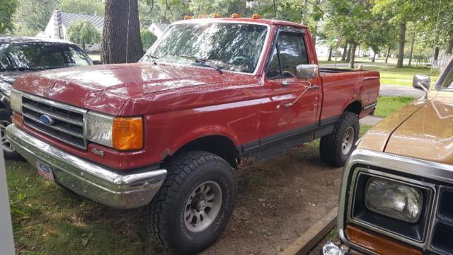 1989 Red Ford F-150 Standard Cab Pickup