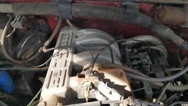 1989 Red Ford F-150 Standard Cab Pickup