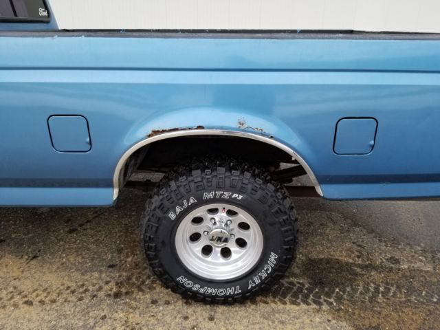 1989 Blue Ford F-150 Standard Cab Pickup
