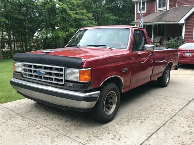 1989 Red Ford F-150 Standard Cab Pickup