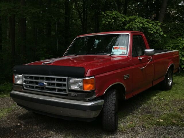 1989 Red Ford F-150 Standard Cab Pickup