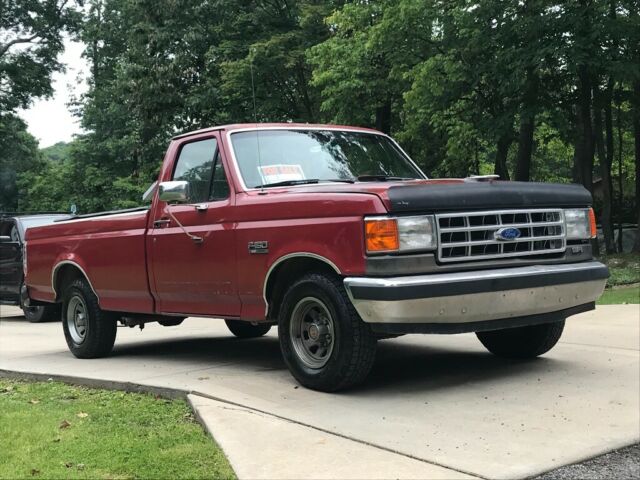 1989 Red Ford F-150 Standard Cab Pickup