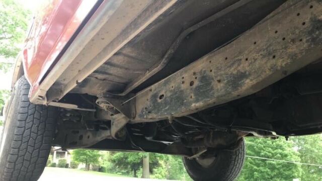 1989 Red Ford F-150 Standard Cab Pickup