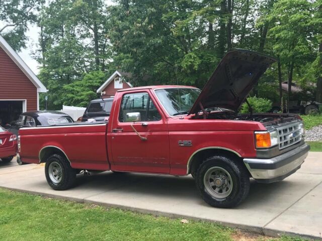 1989 Red Ford F-150 Standard Cab Pickup