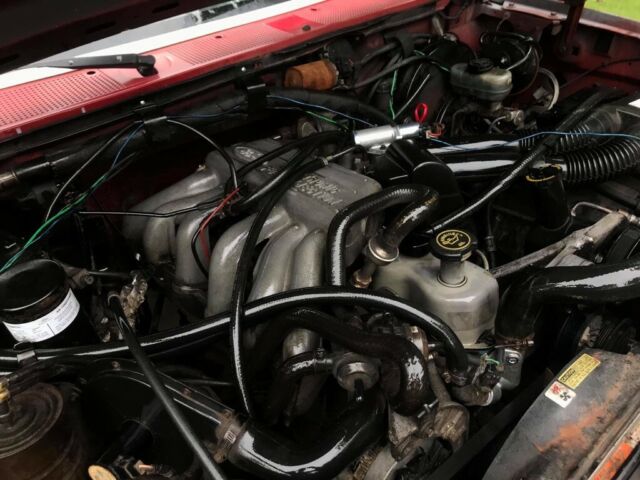 1989 Red Ford F-150 Standard Cab Pickup