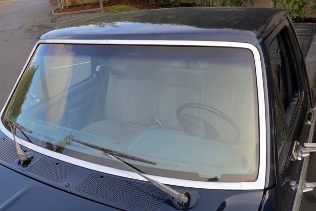 1989 Blue over Silver Ford F-250 Standard Cab Pickup