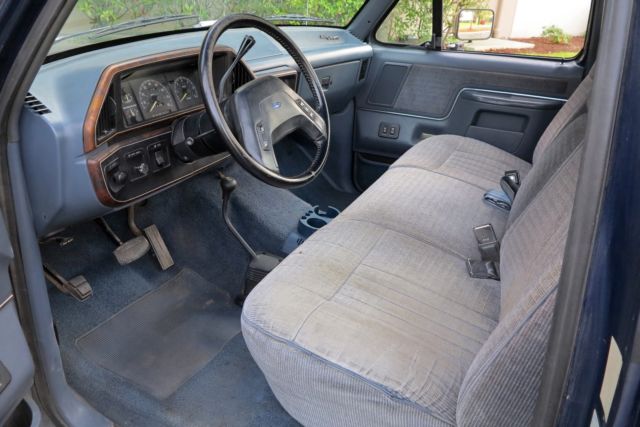 1989 Blue over Silver Ford F-250 Standard Cab Pickup