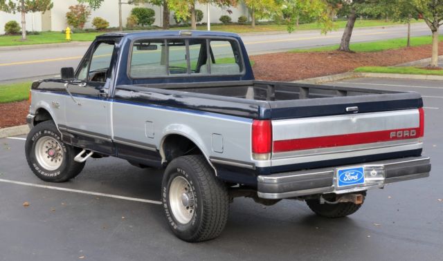1989 Blue over Silver Ford F-250 Standard Cab Pickup
