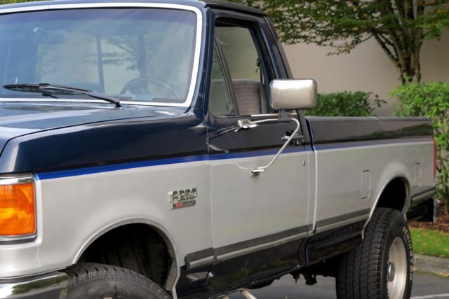 1989 Blue over Silver Ford F-250 Standard Cab Pickup