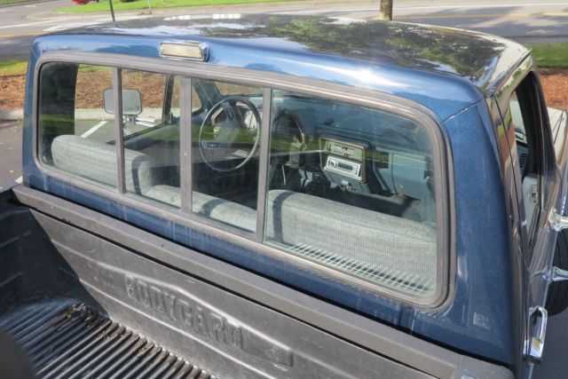 1989 Blue over Silver Ford F-250 Standard Cab Pickup