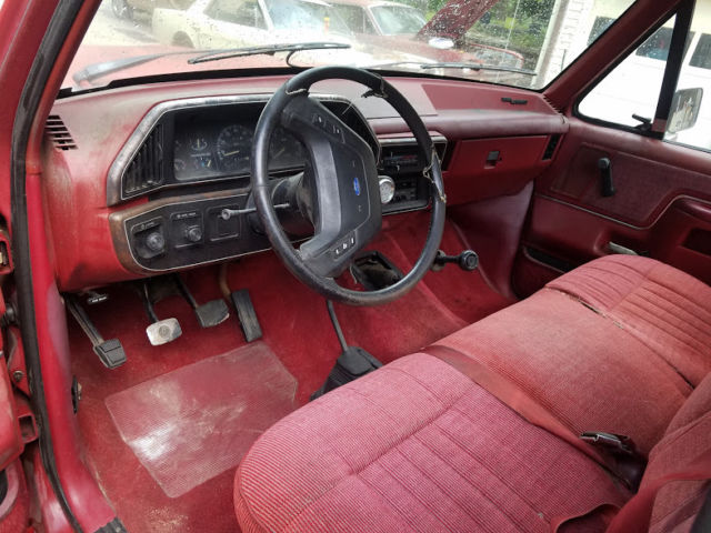 1989 Red Ford F-150 Standard Cab Pickup