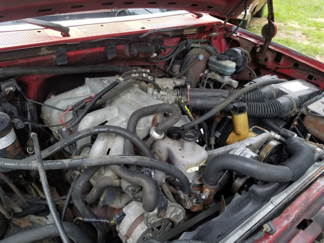 1989 Red Ford F-150 Standard Cab Pickup