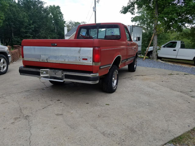 1989 Red Ford F-150 Standard Cab Pickup