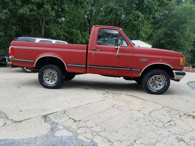 1989 Red Ford F-150 Standard Cab Pickup