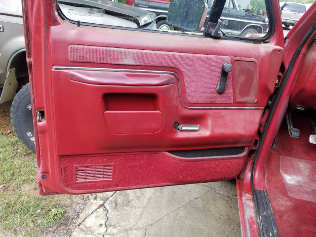 1989 Red Ford F-150 Standard Cab Pickup