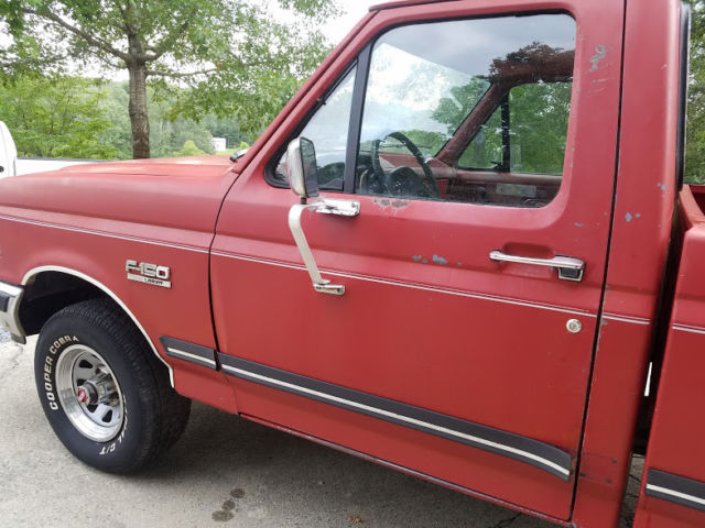 1989 Red Ford F-150 Standard Cab Pickup