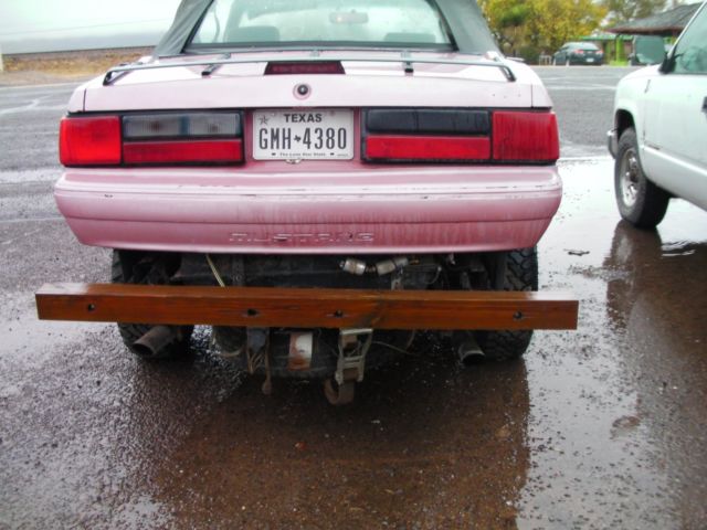 1989 poor pink Ford Mustang