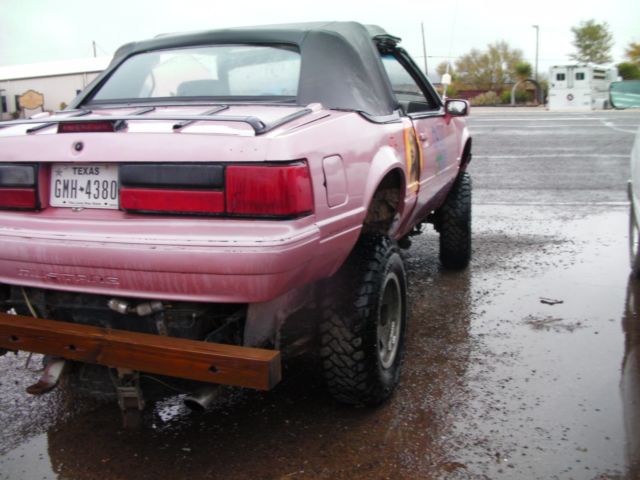 1989 poor pink Ford Mustang