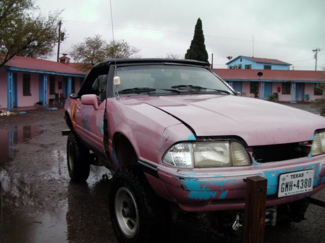 1989 poor pink Ford Mustang