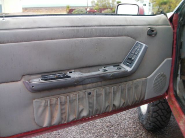 1989 poor pink Ford Mustang