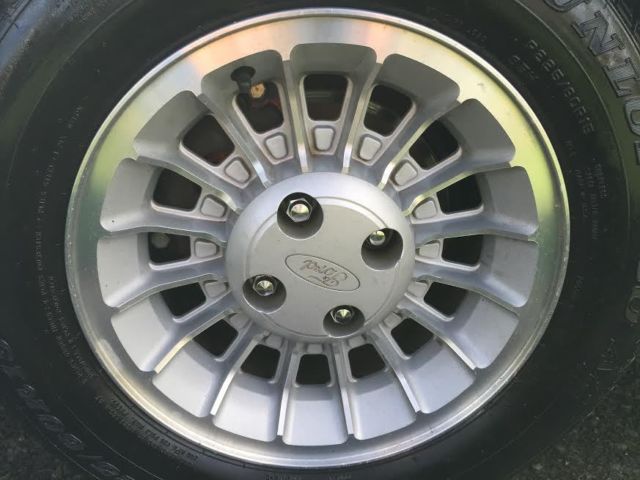 1989 black and gray Ford Mustang Hatchback