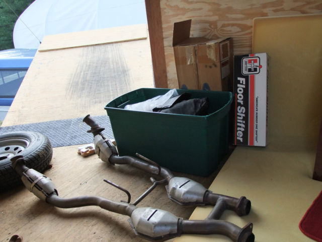 1989 red Ford Mustang Hatchback