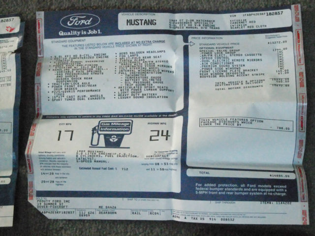 1989 red Ford Mustang Hatchback