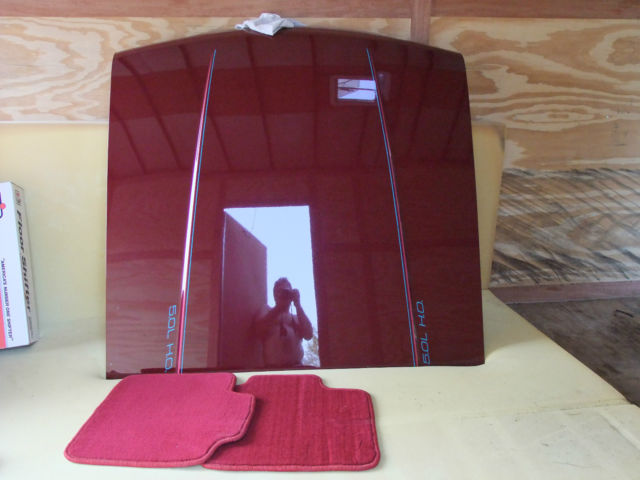 1989 red Ford Mustang Hatchback