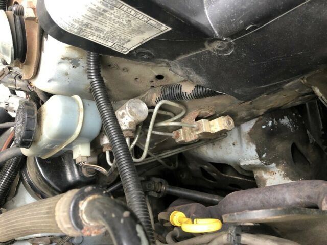 1989 White Ford Mustang Convertible